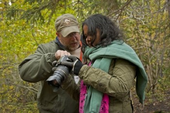 Instructor Les Voorhis of Outdoor Photo Workshops helps a Black Hills Photo Shootout attendee understand how to take better pictures in Spearfish Canyon. (Photo by Jenna Nagel)