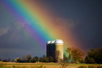 Rainbow over silos east of Baltic.