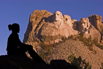 A summer sunrise gives a nice color to the mountain, but the shadows can hide Roosevelt's face.
