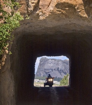 A view of Mount Rushmore from one of the road's three tunnels. Photo by <a href='http://www.dakotagraph.com' target='_blank'>Chad Coppess</a>.