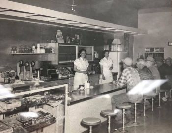 Irene Antonen (left) and Vi Andrews inside the Andrews Cafe in Lake Norden in the 1950s.
