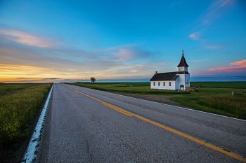 Peace Valley Church at dusk along Highway 79 in northeast Harding County.